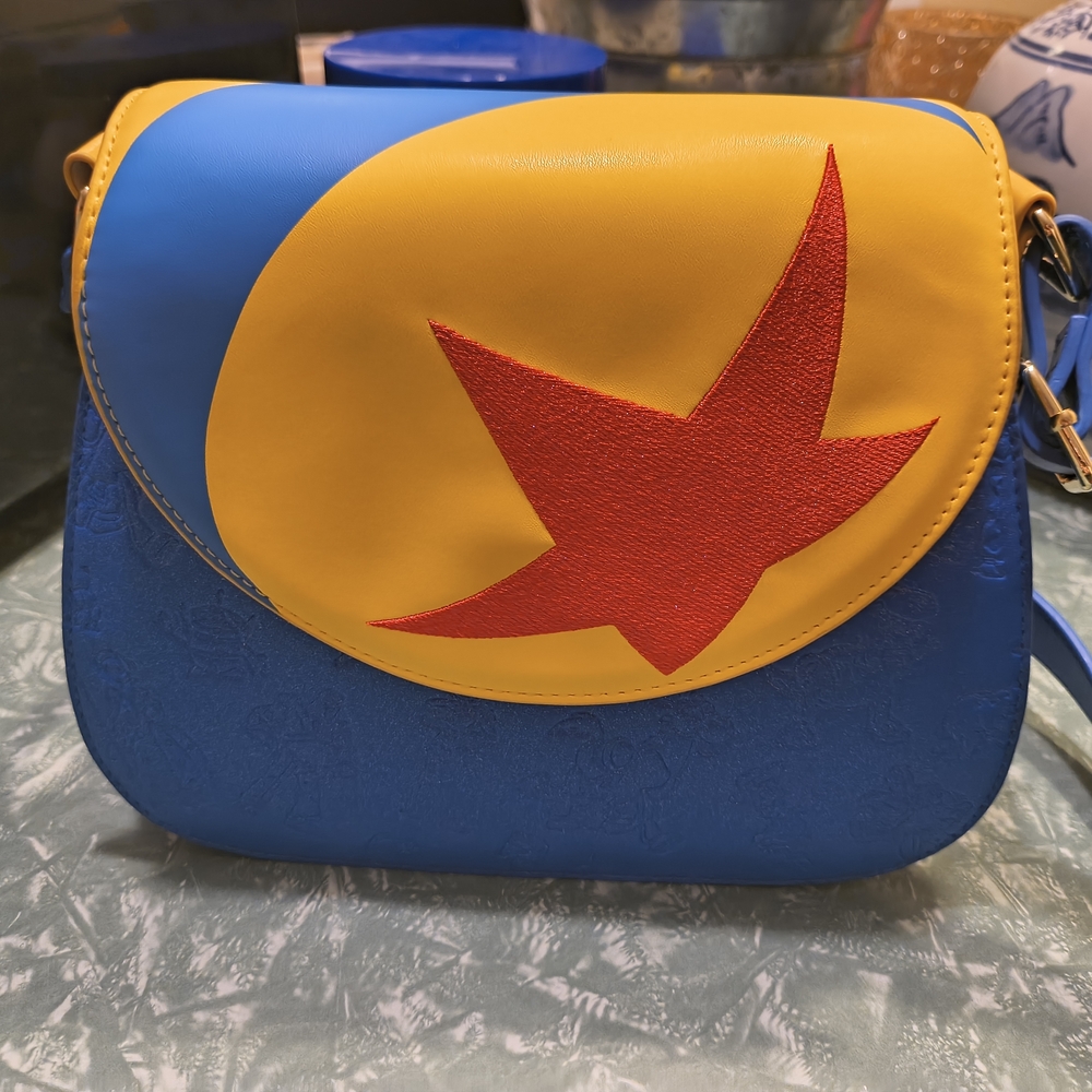 Loungefly Blue and Yellow Crossbody Bag with Red Star